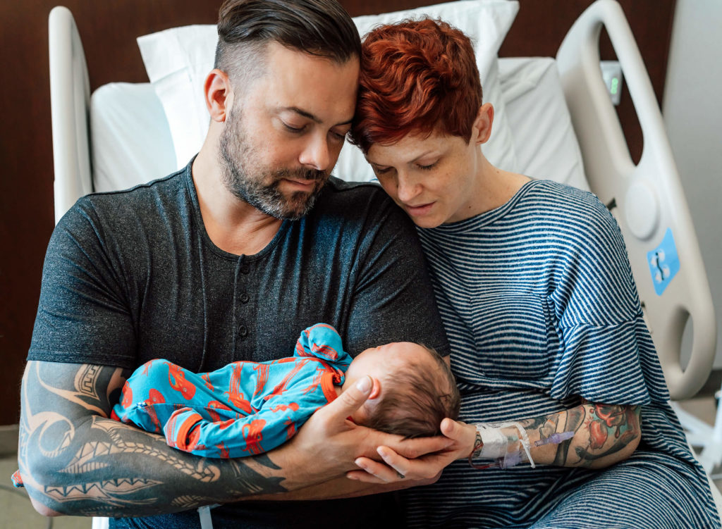 parents with newborn in the hospital during fresh session 