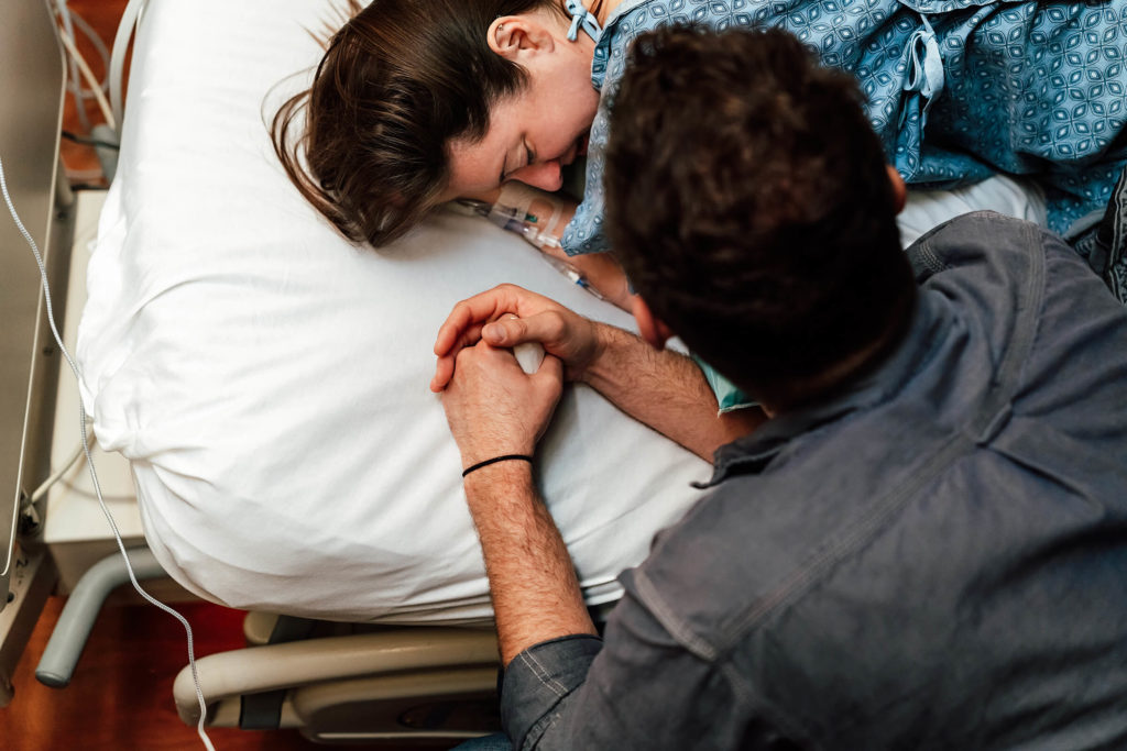 mother being supported by her husband while in labor at Summerlin Hospital