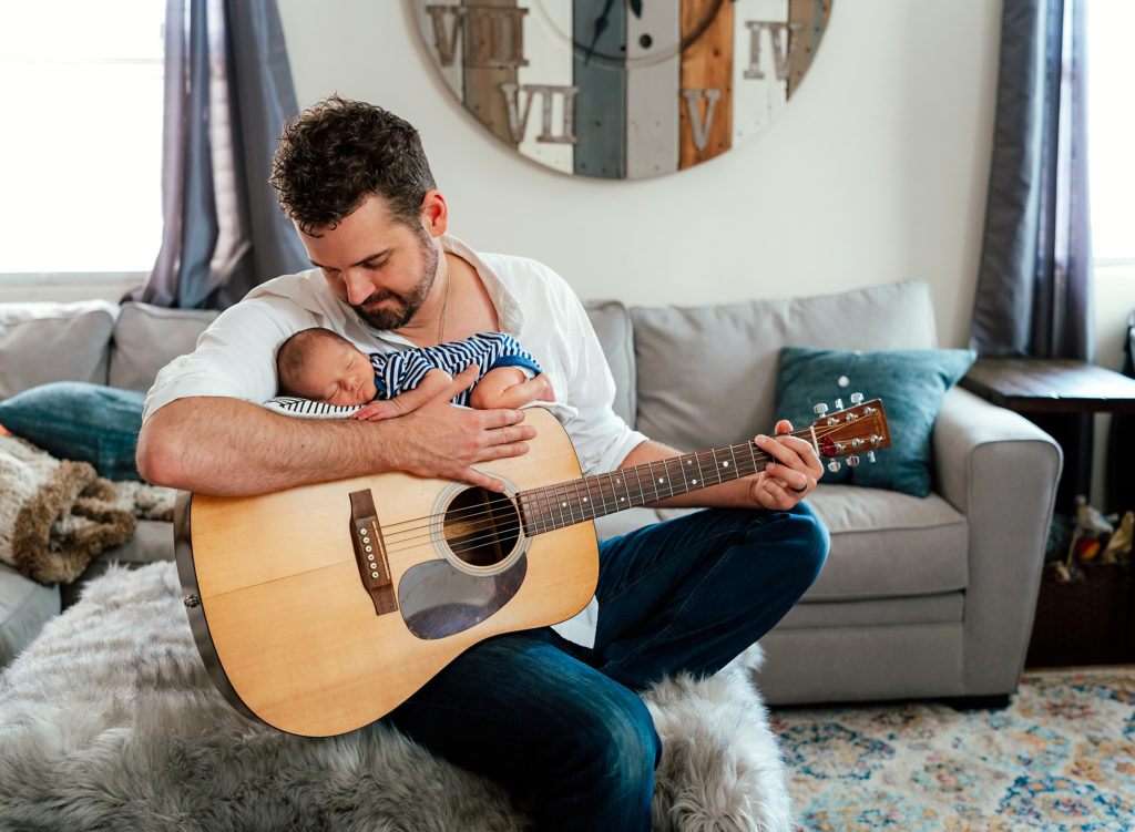 Dad incorporating guitar into newborn session with son 