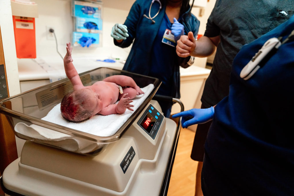 weighing baby on a scale at San Martin St. Rose hospital in Las Vegas