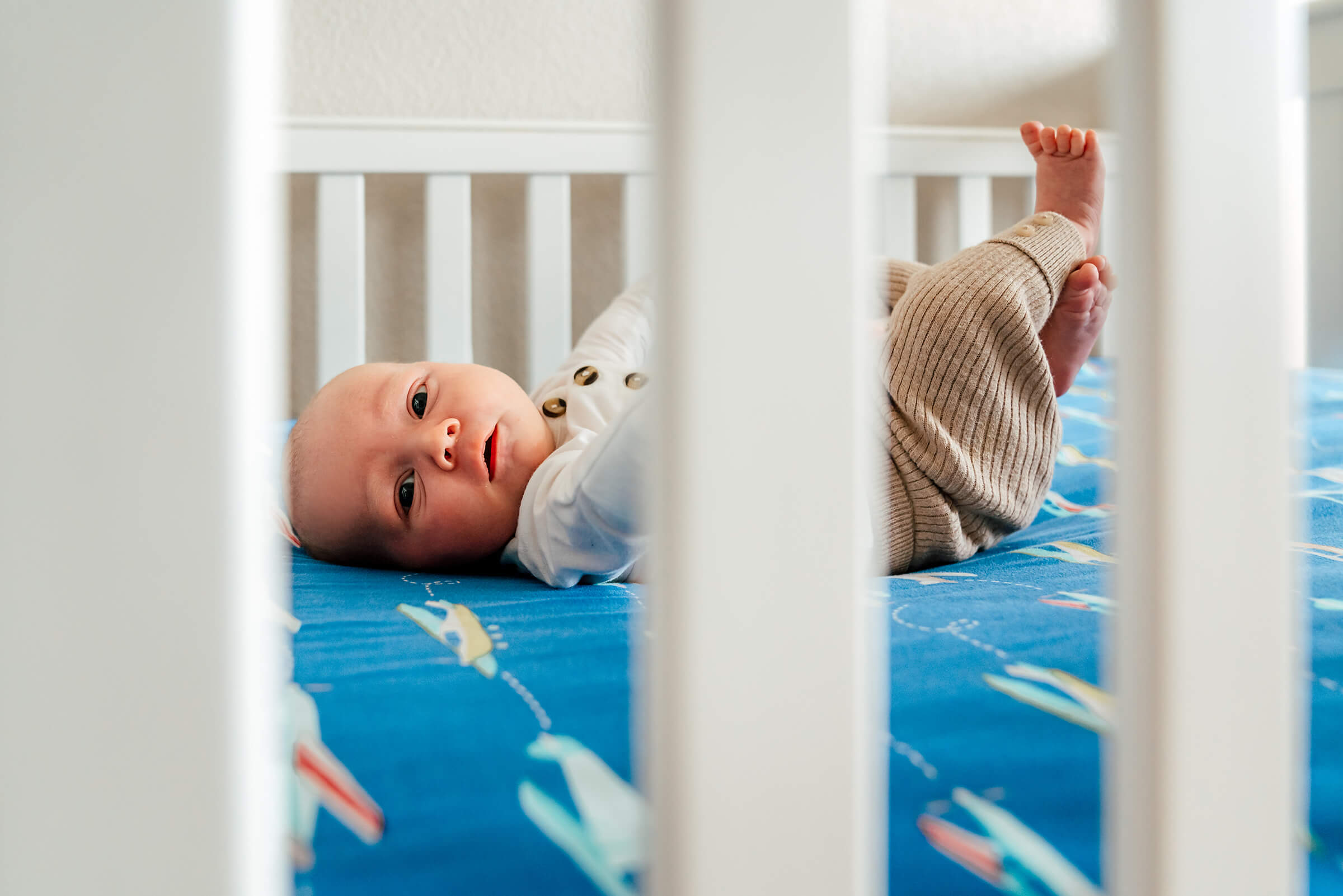 baby in his crib during an in-home newborn session in Las Vegas
