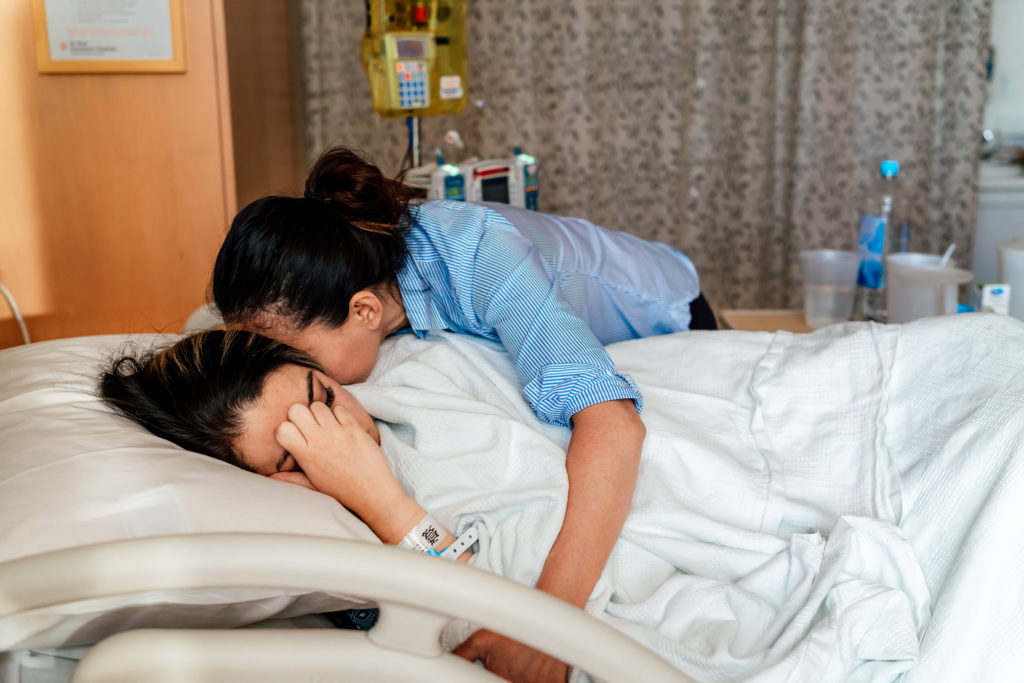 friends supporting each other in labor in a hospital in southern nevada