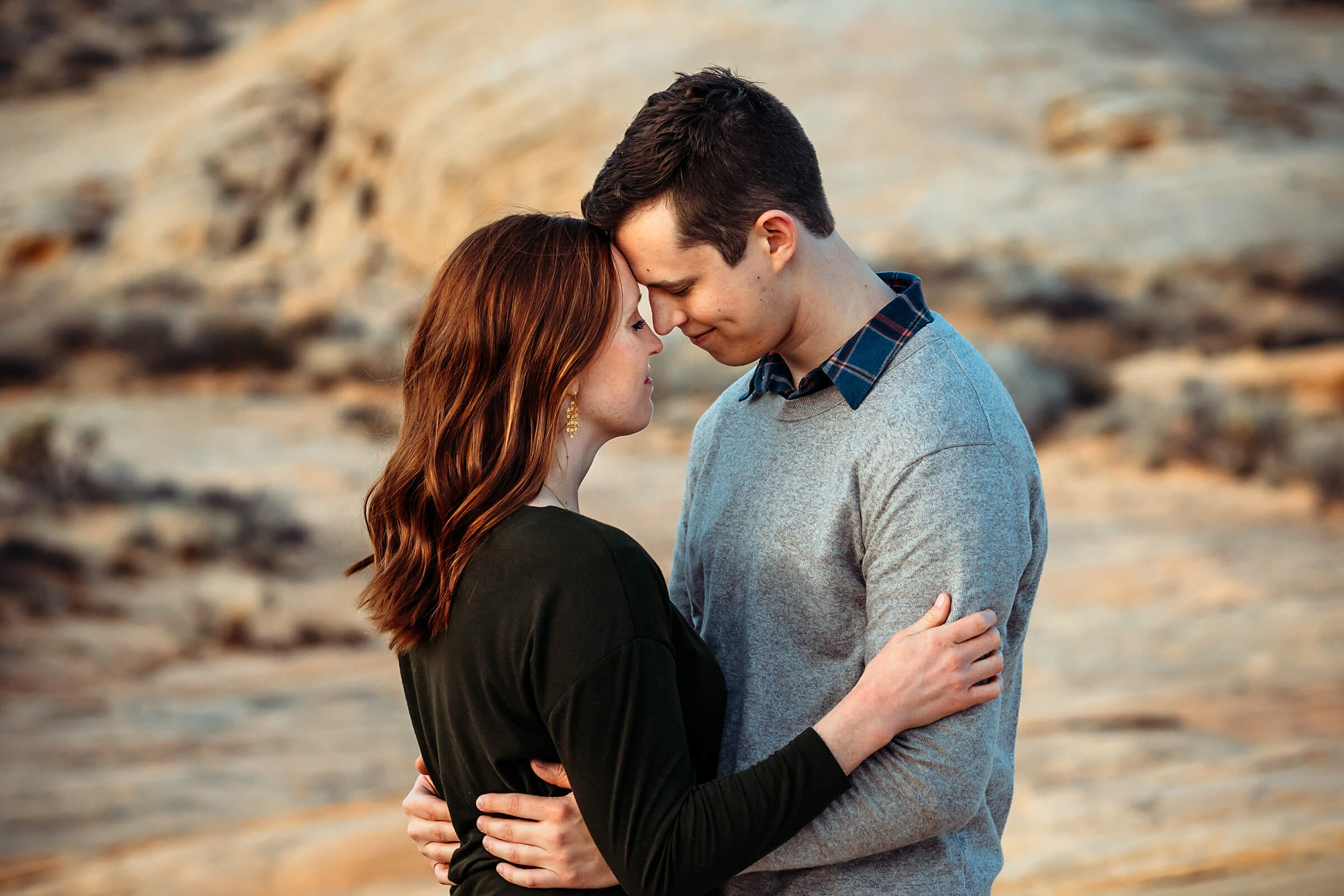 couple together during family session during a tender moment