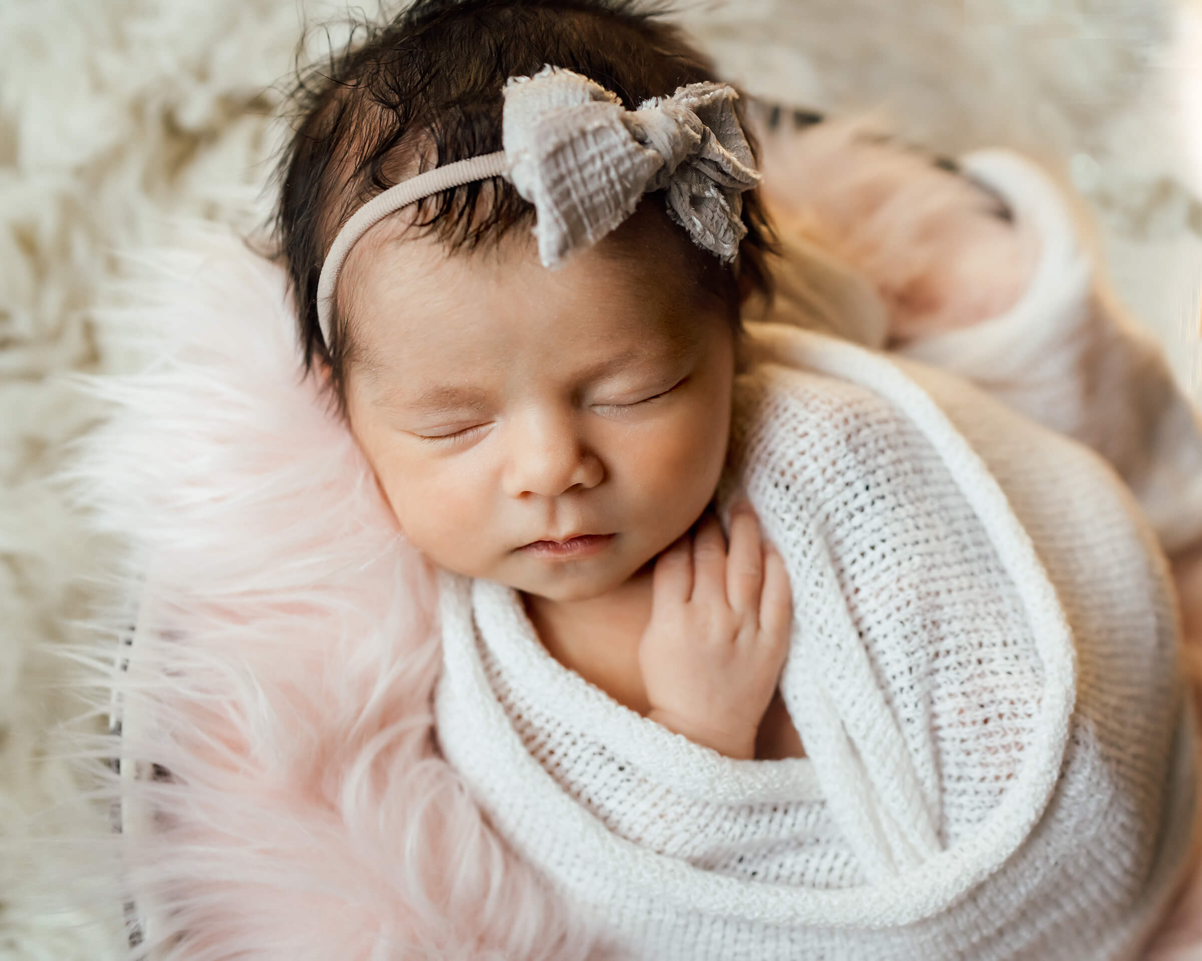 sweet newborn session with creams on a baby girl