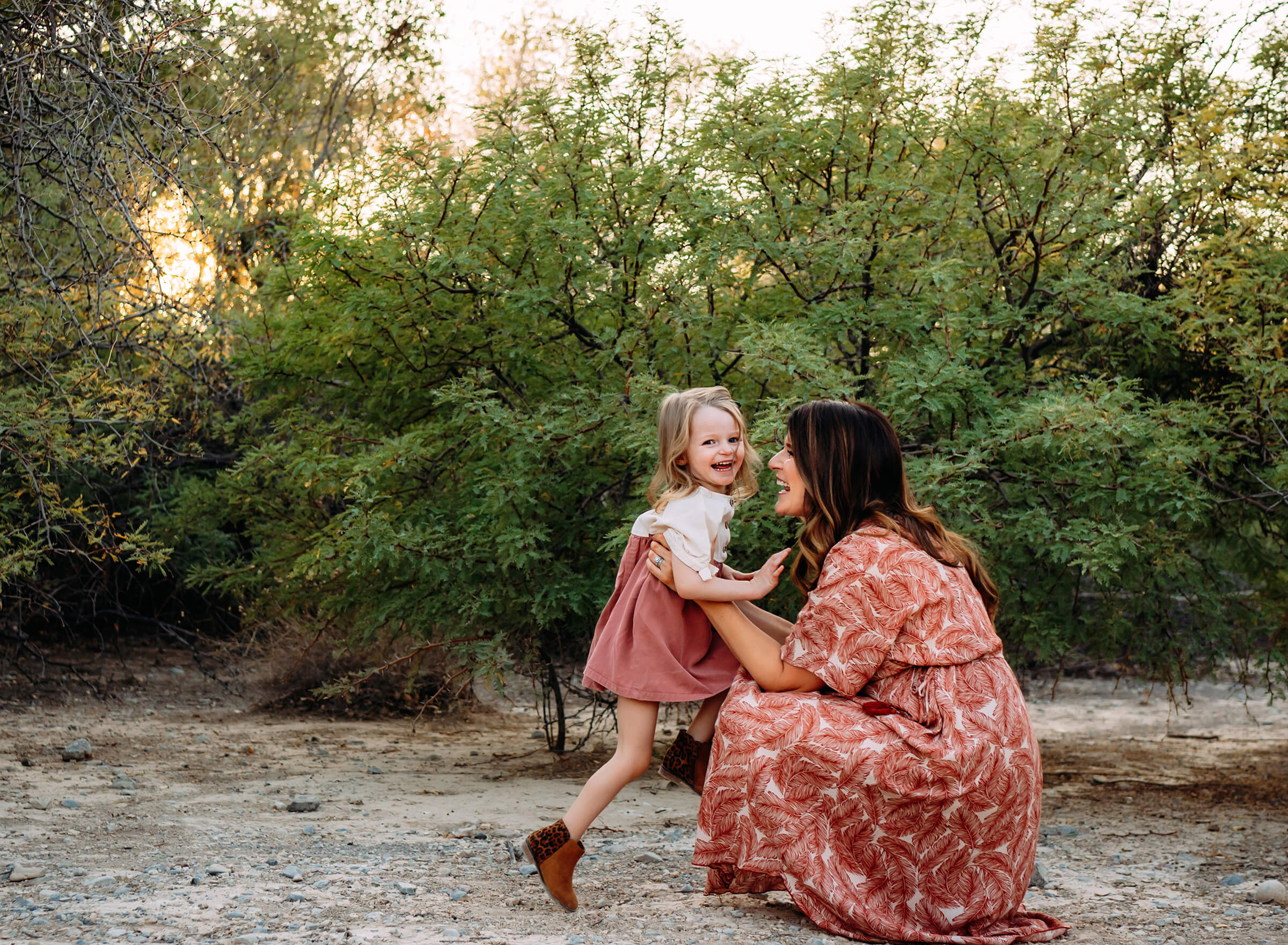 playful moments between mom and daughter during family session