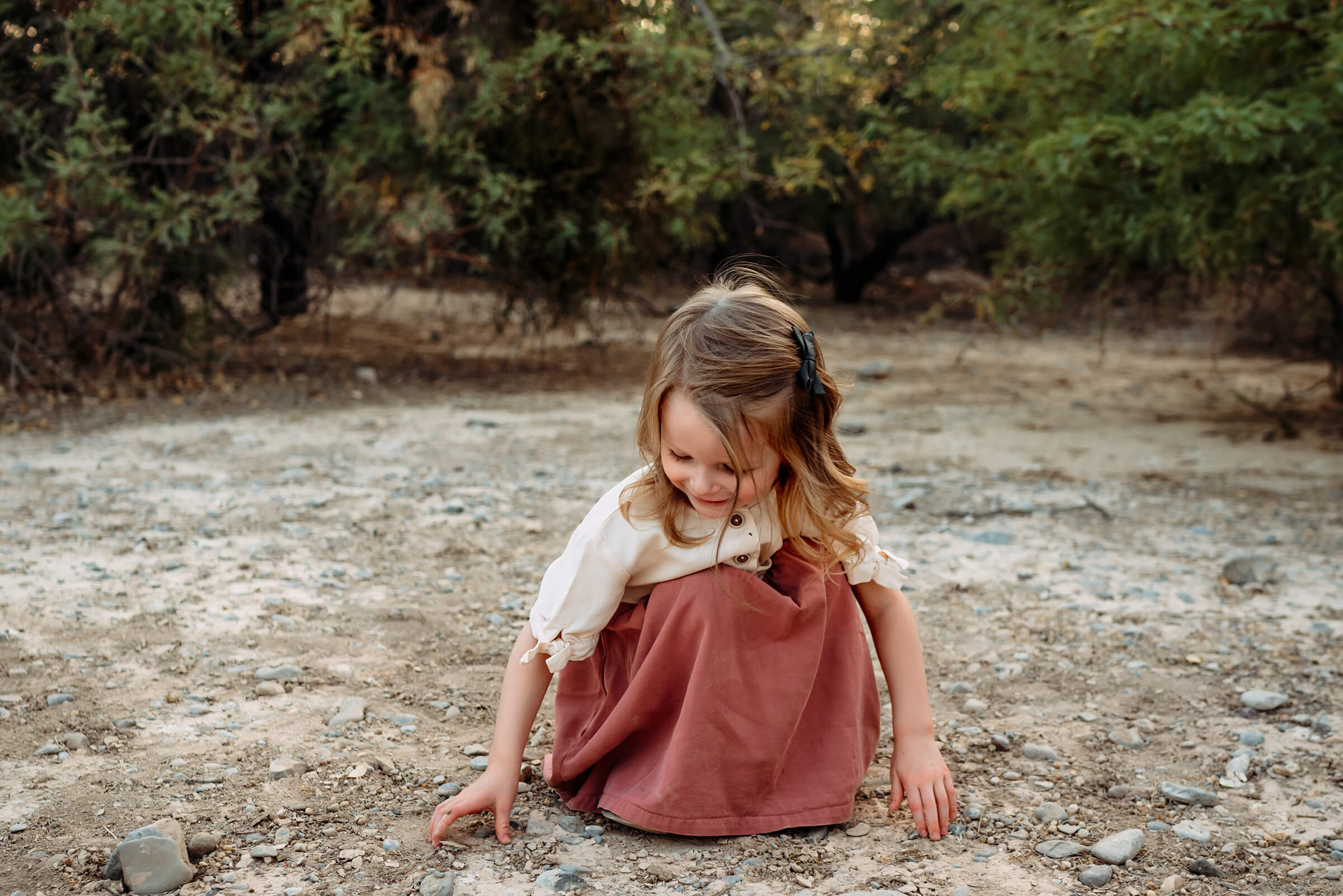 girl playing in the dirt