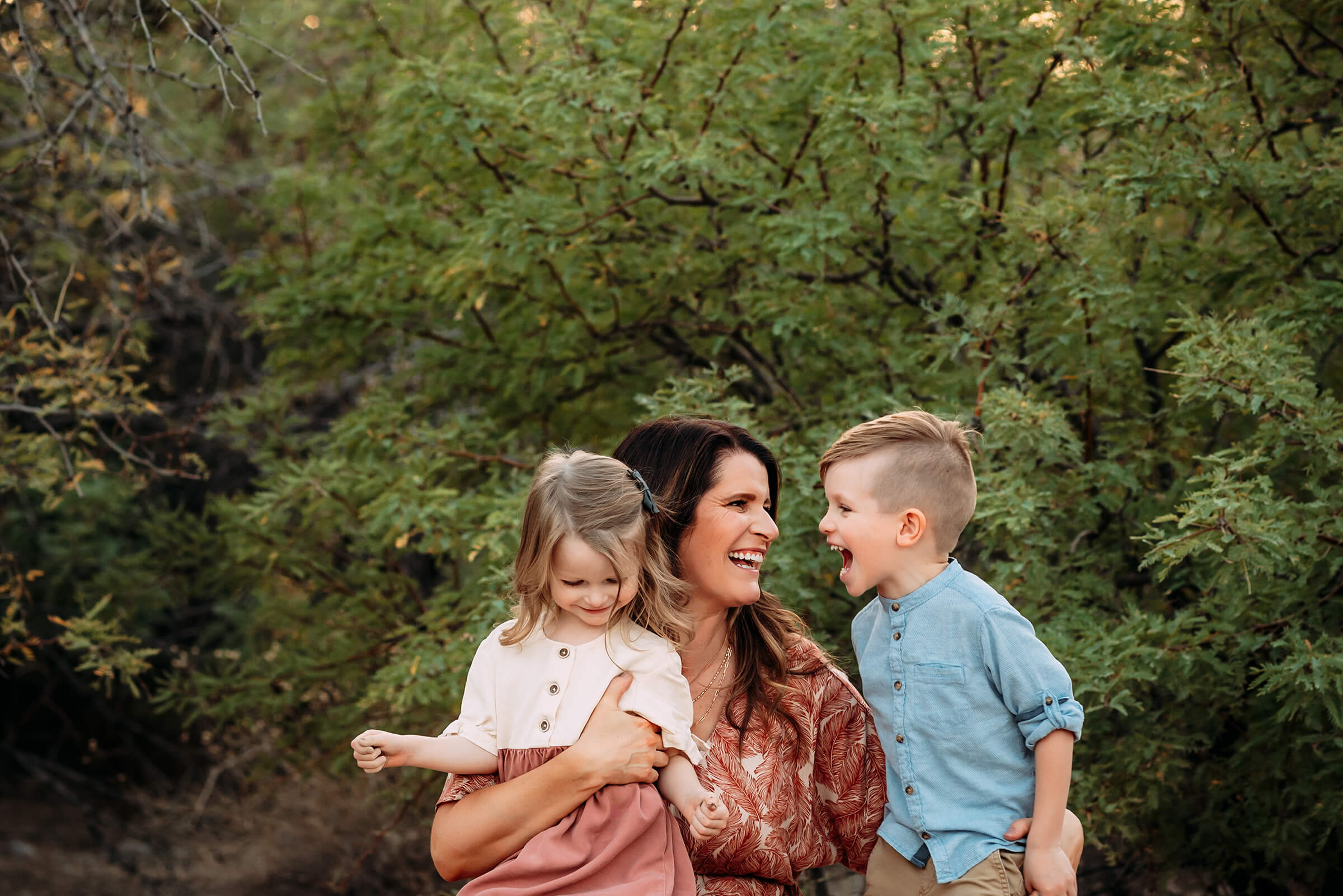 mom and her two oldest children during beautiful family session
