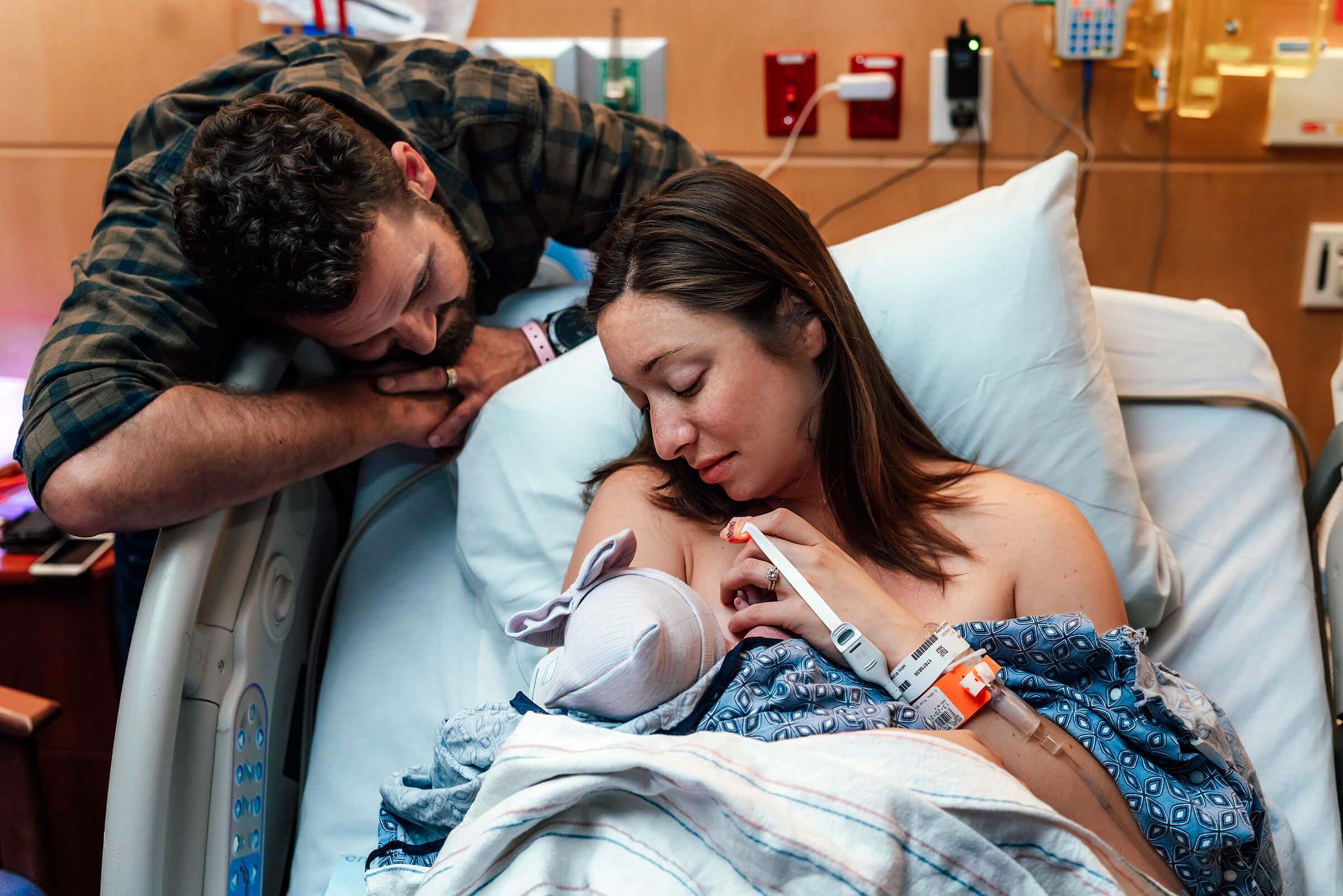 tender moments as a family after delivery
