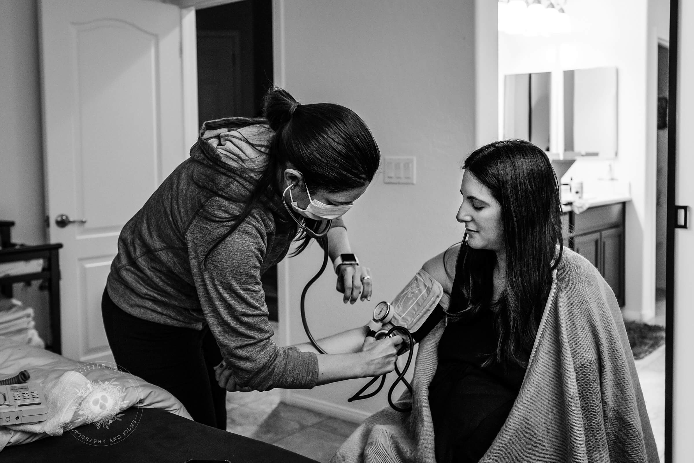 Las Vegas midwife checking her patient's blood pressure