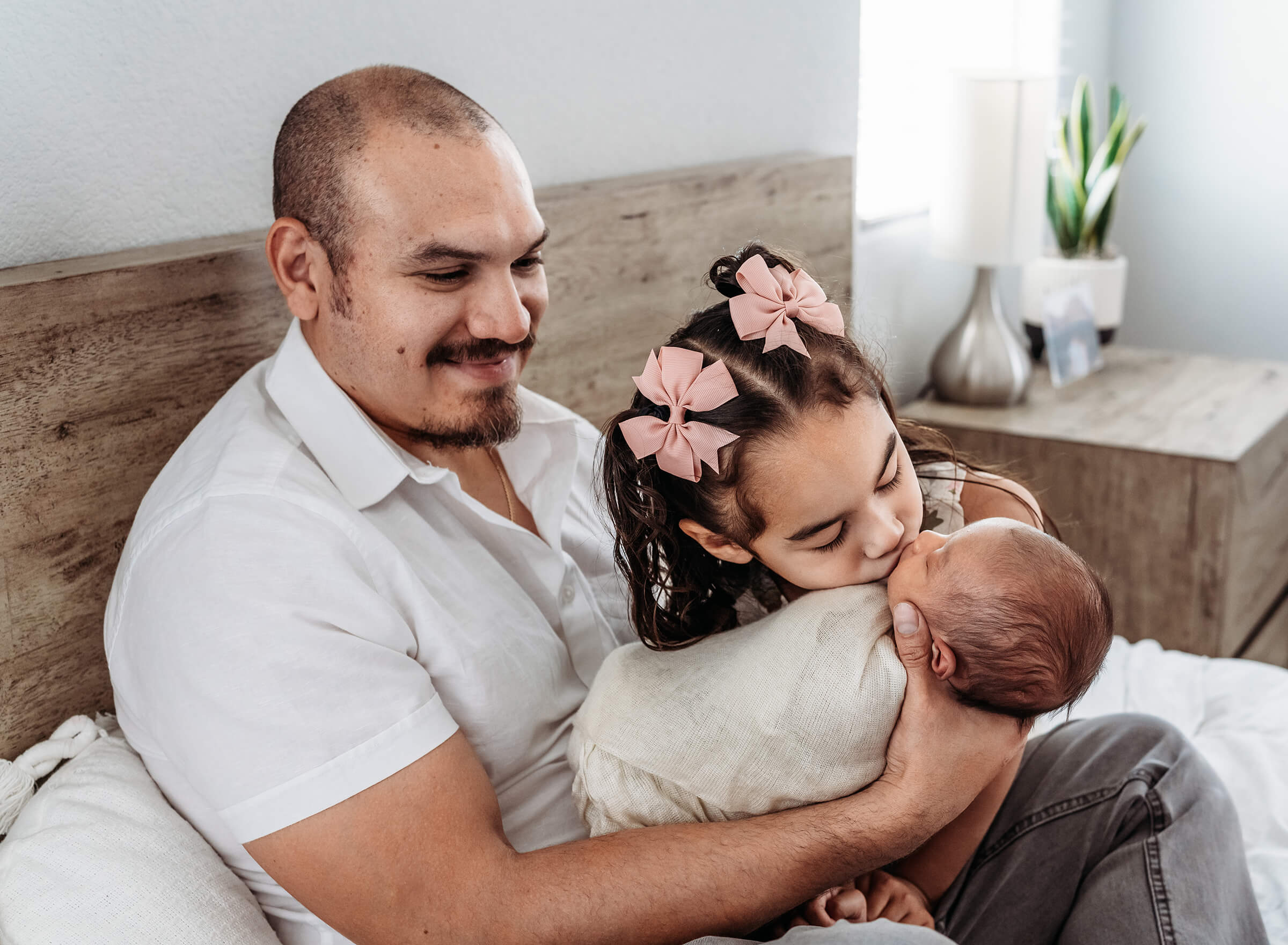 father with his daughter and son newborn session 