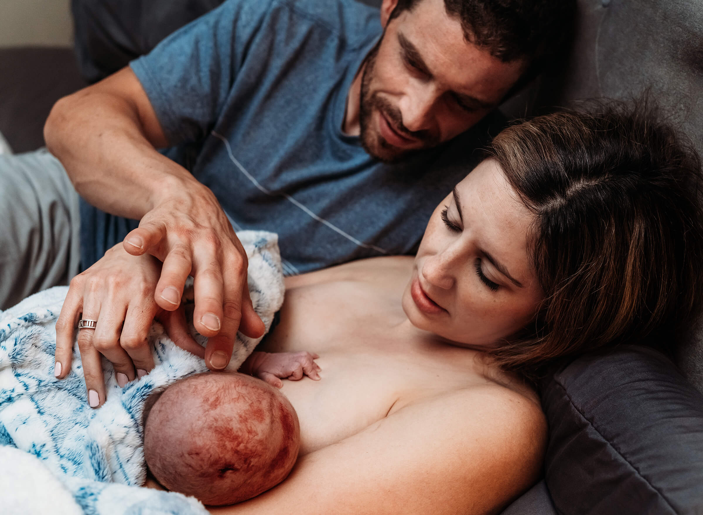parents with newborn son after a homebirth
