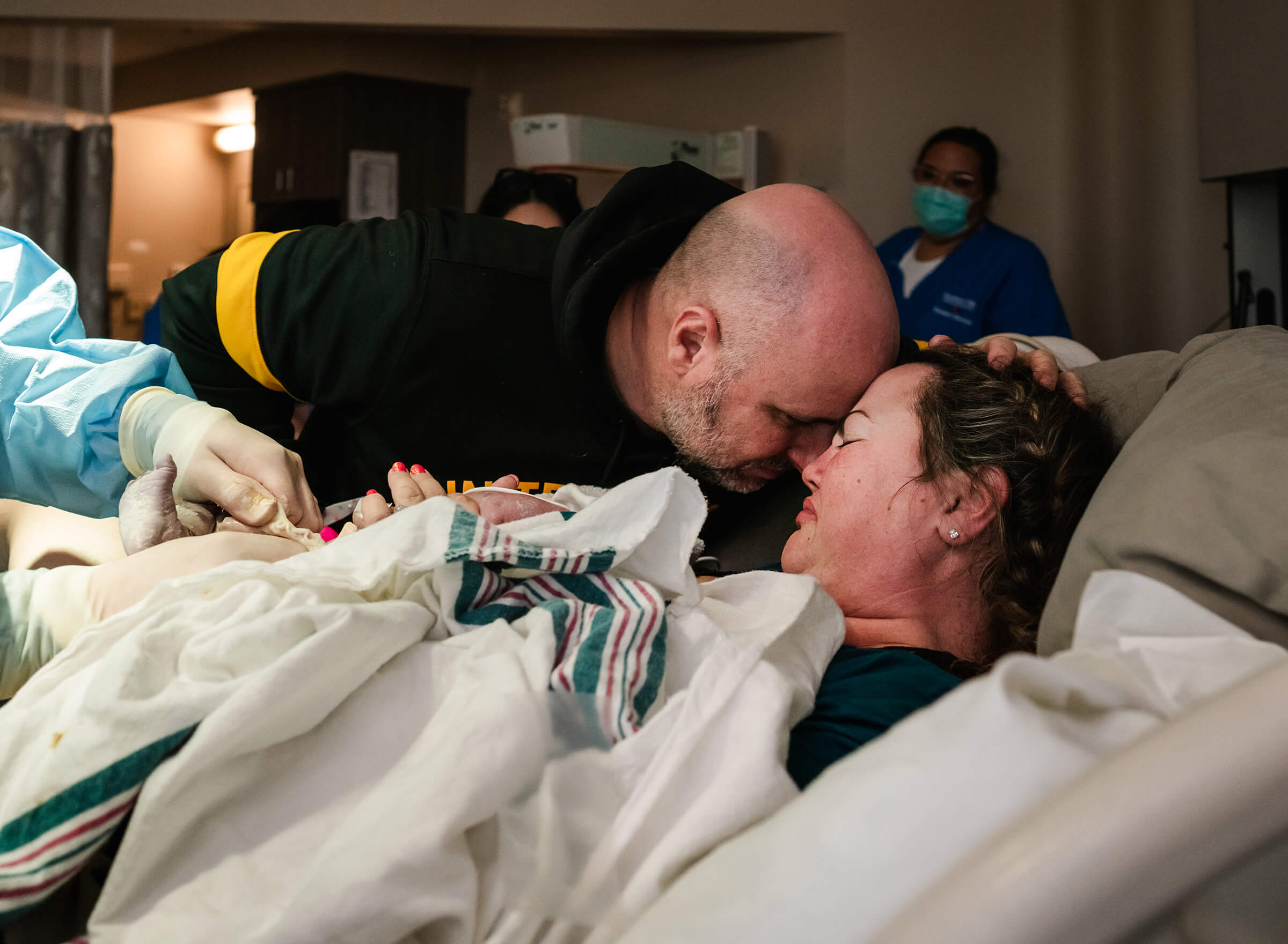 mother and father emotional after birth at Southern Hills Hospital