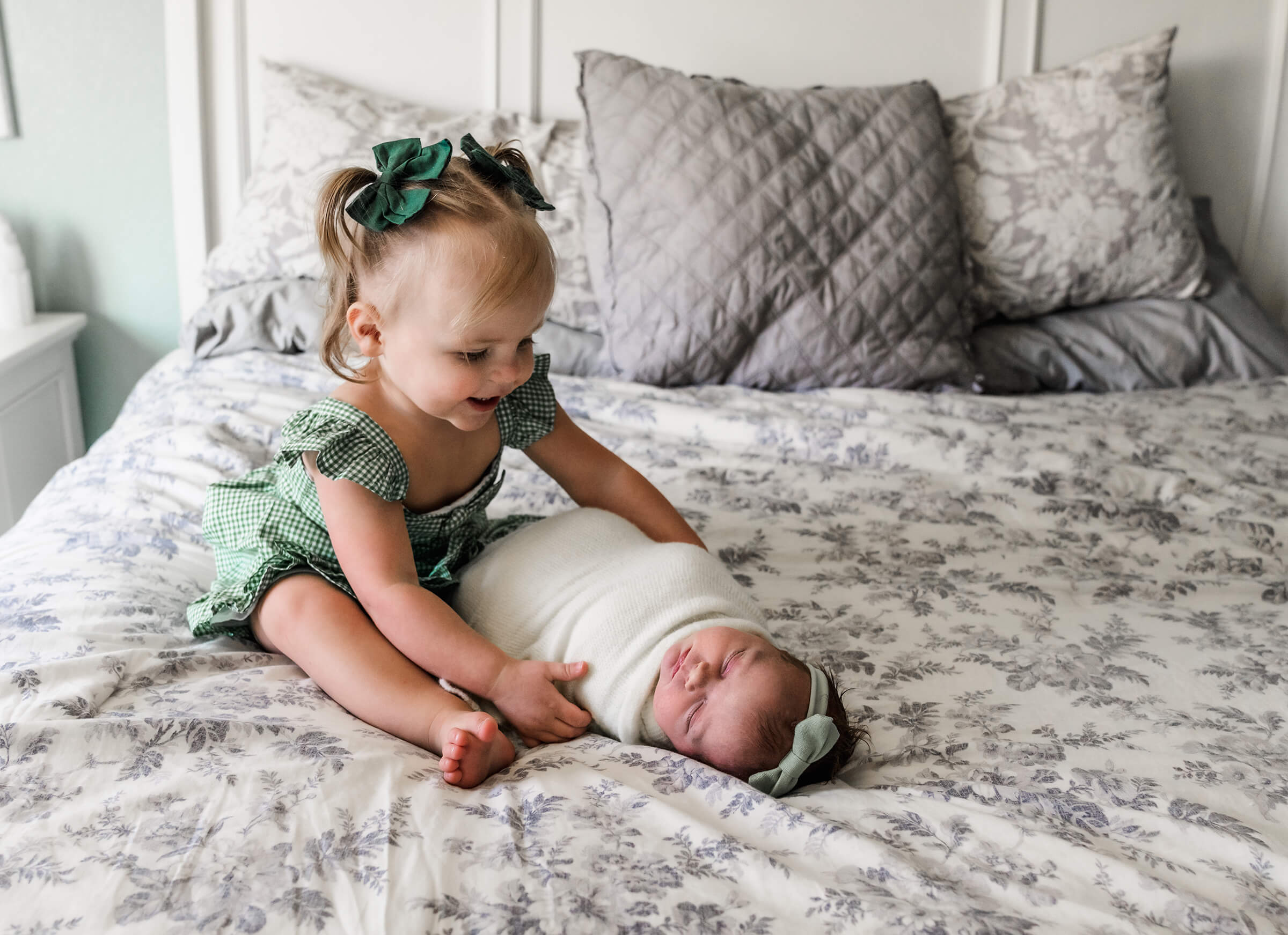 sisters together during newborn session in Las Vegas