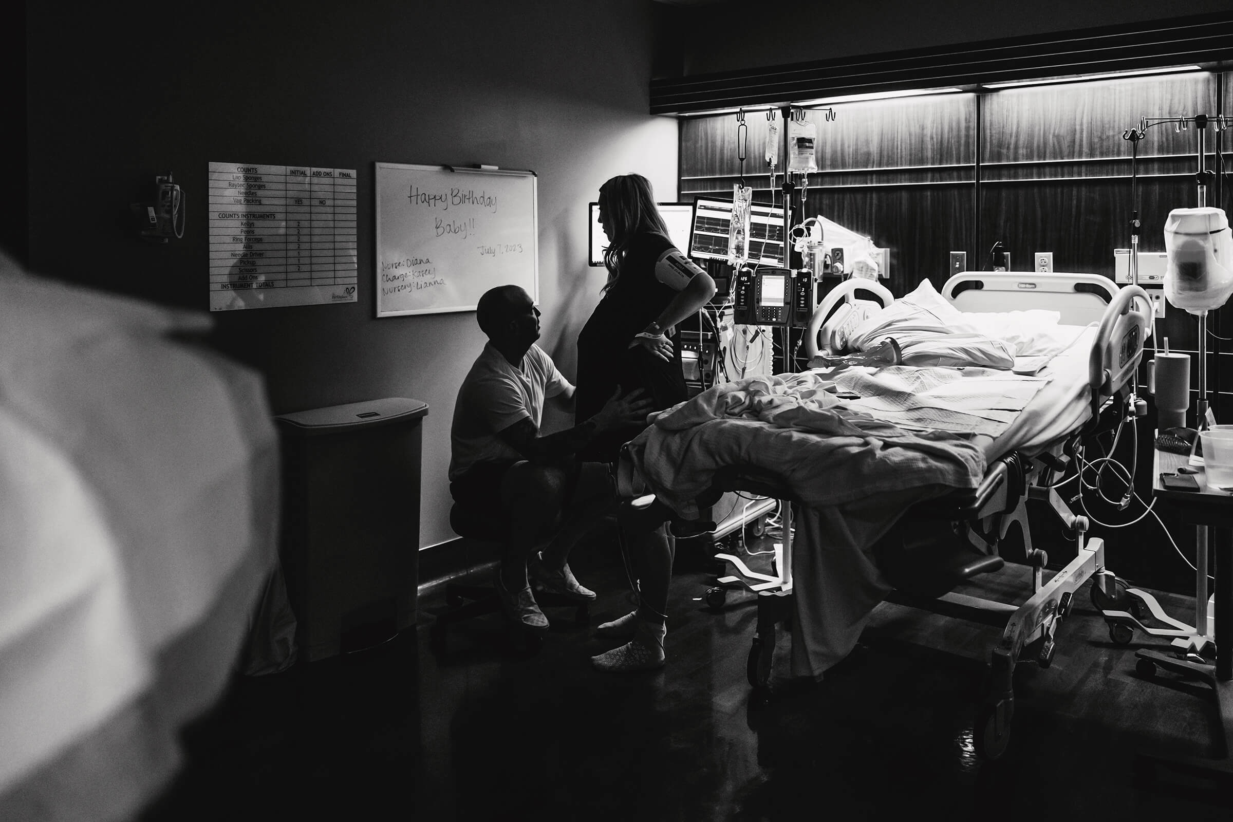 black and white image of a quiet and serene hospital birth space