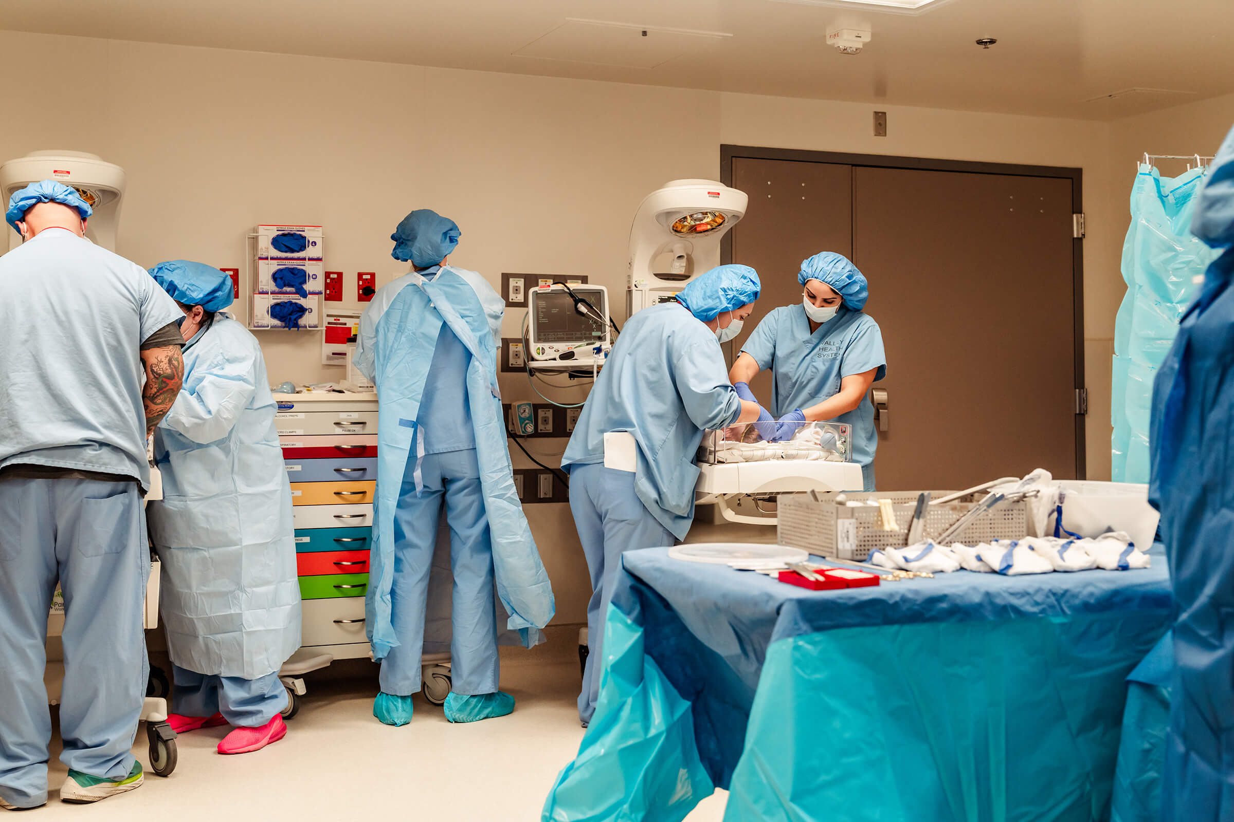 birth team with twin A in operating room at Summerlin Hospital
