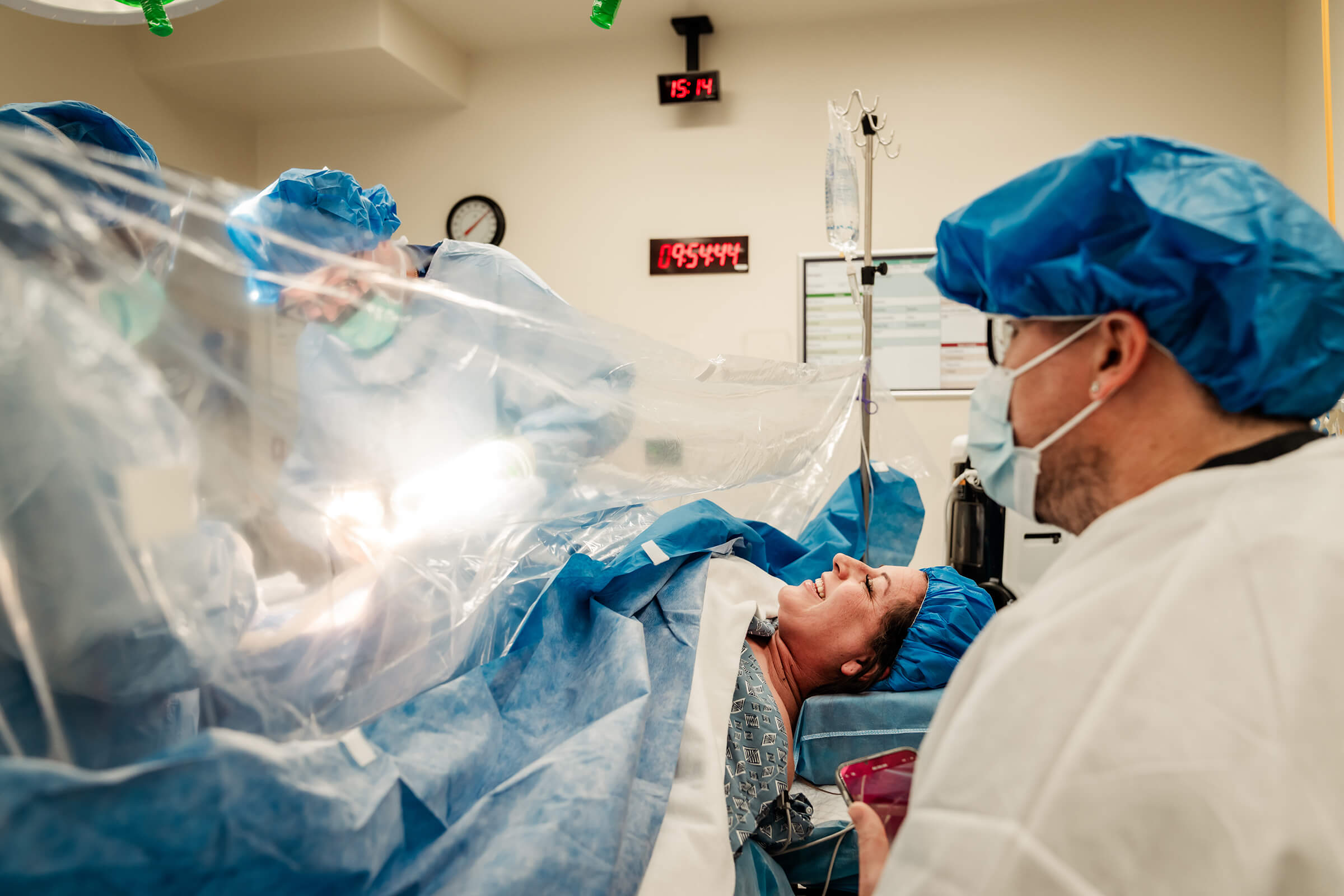 Dr. Wilkes delivers twins via gentle cesarean using a clear drape