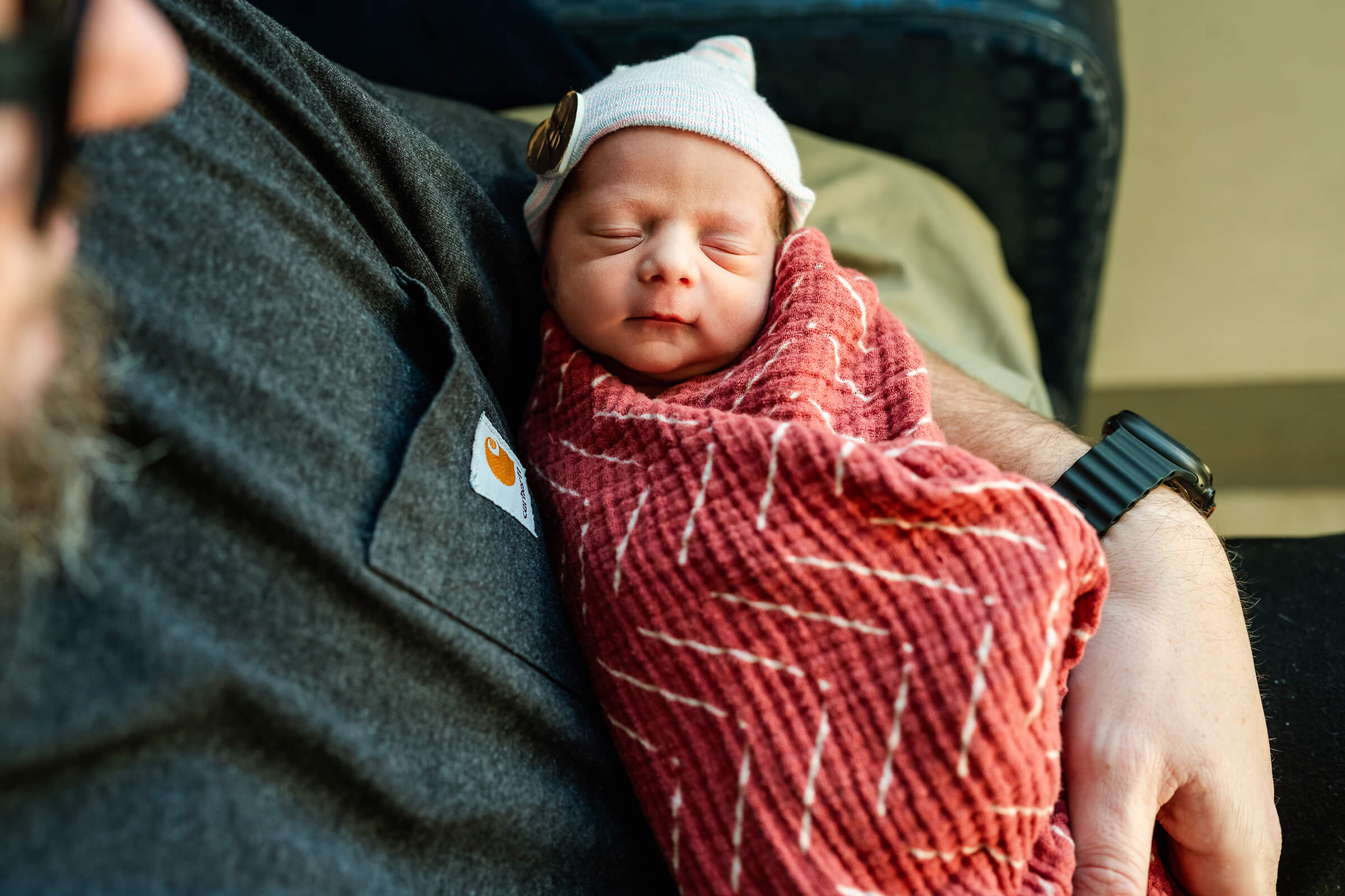 Dad holding one of his twins during a Fresh session at Summerlin hospital
